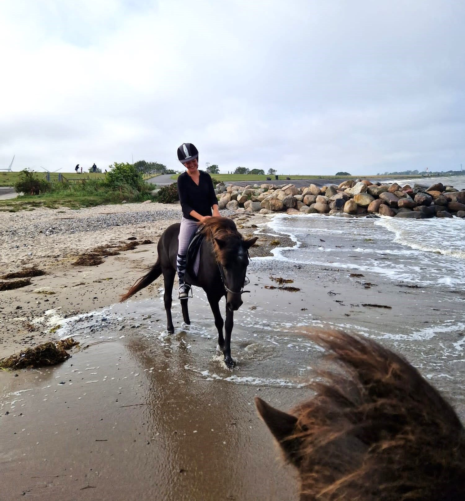 Reiten am Strand im Inselosten